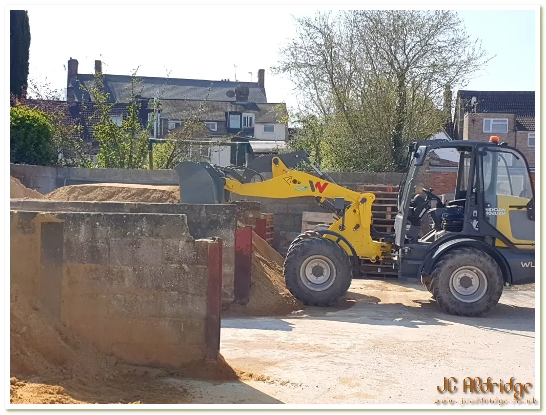Gloucestershire builders yard Wacker Neuson loader