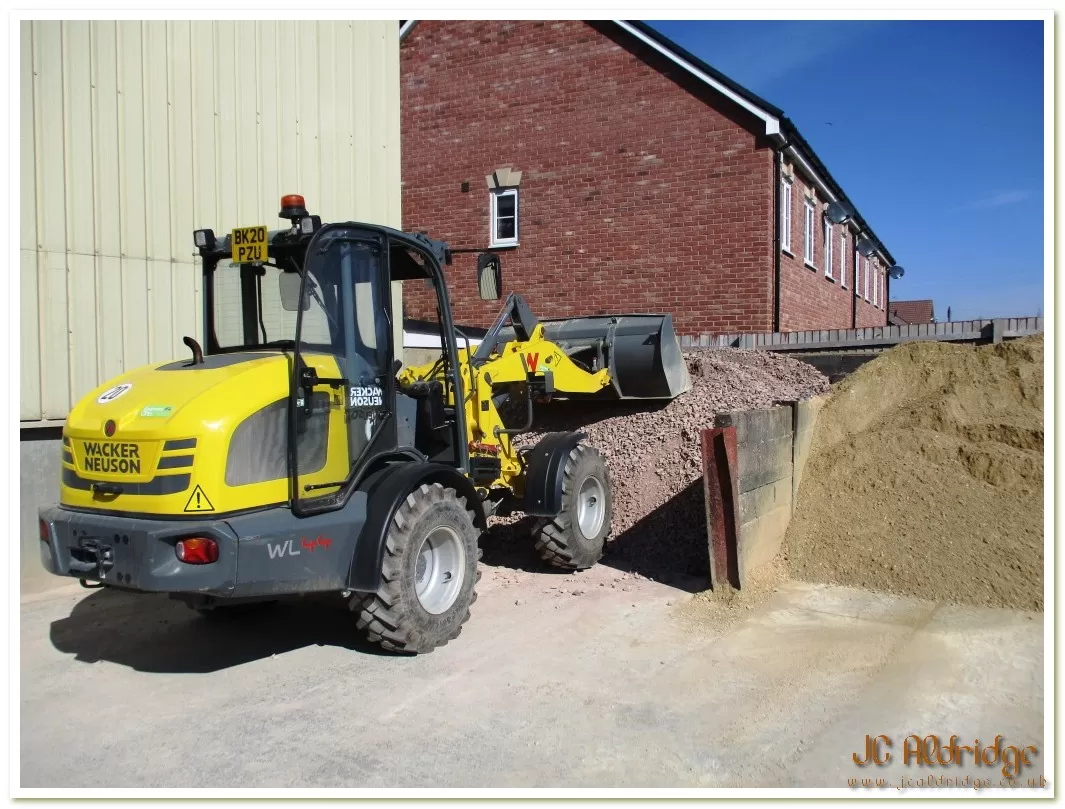 Gloucestershire builders yard Wacker Neuson loader